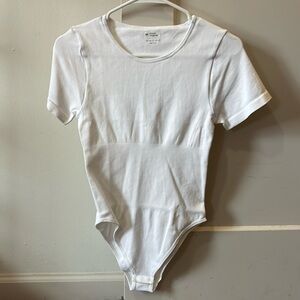 White Bodysuit Size M. Never worn before